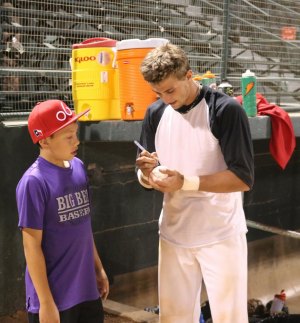 Cowboys Take First of Four from Diablos 6-3 Billy Crowe takes time out for a fan after the game. (Courier Photo: Bryon Garrison)